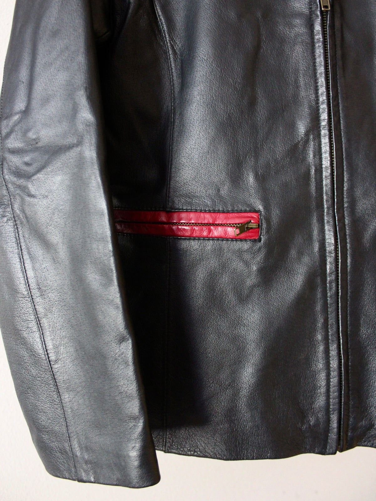VINTAGE BLACK LEATHER JACKET W/ RED TRIM