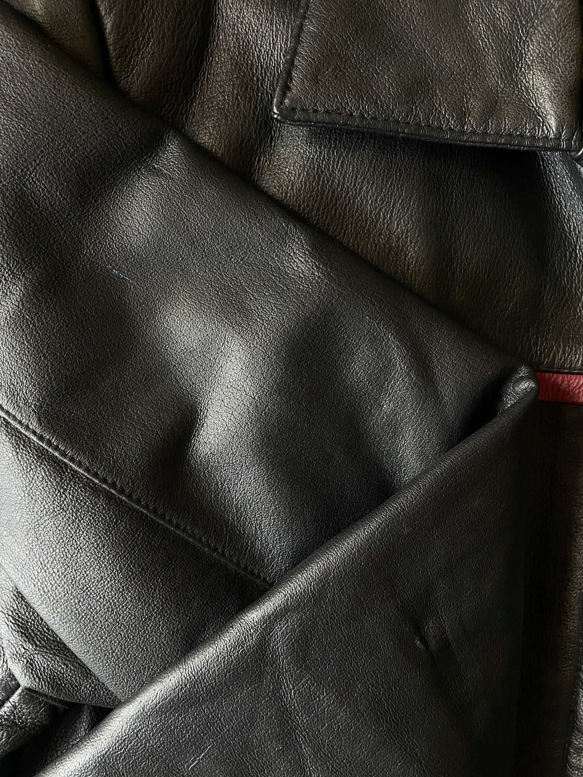 VINTAGE BLACK LEATHER JACKET W/ RED TRIM